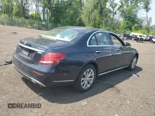 2017 Mercedes-Benz E 300 Luxury with VIN WDDZF4KBXHA185598, listed as a Copart auction lot 61011935 with 59,116 mi miles and Salvage title. Bid and sale history available at DreamBid. Image 3.