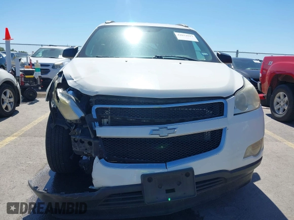 2012 Chevrolet Traverse LS z VIN 1GNKREED8CJ125437, wystawiony jako IAAI lot #42073517 z przebiegiem 48 433 mil mil oraz . Historia ofert i sprzedaży dostępna na DreamBid. Obrazek 6.