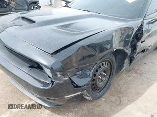 2016 Dodge Challenger R/T Plus with VIN 2C3CDZBT7GH177992, listed as a IAAI auction lot 42136475 with 132,808 mi miles and . Bid and sale history available at DreamBid. Image 6.