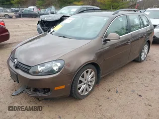 2012 Volkswagen Jetta SportWagen TDI w/Sunroof with VIN 3VWPL7AJ6CM647247, listed as a IAAI auction lot 42042449 with 186,015 mi miles. Bid and sale history available at carsss.com. Image 2.