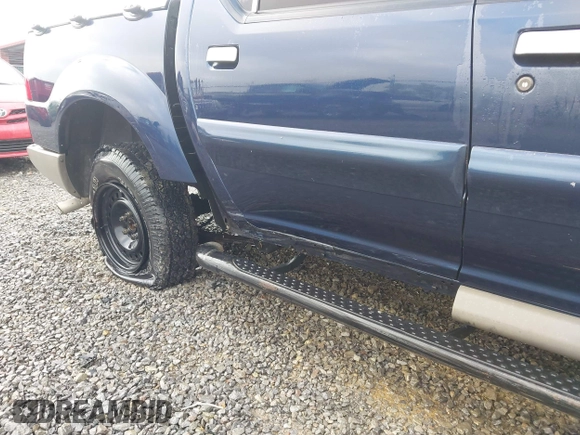 2003 Ford Explorer Sport Trac XLS z VIN 1FMZU67E23UA17889, wystawiony jako IAAI lot #42167263 z przebiegiem 189 849 mil mil oraz . Historia ofert i sprzedaży dostępna na DreamBid. Obrazek 6.