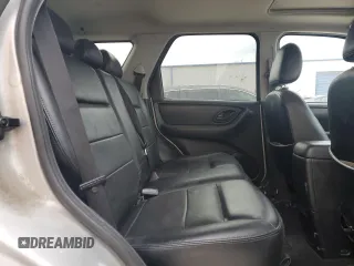 2006 Ford Escape Limited with VIN 1FMCU94196KA99953, listed as a Copart auction lot 88786175 with 154,129 mi miles and Salvage title. Bid and sale history available at DreamBid. Image 11.