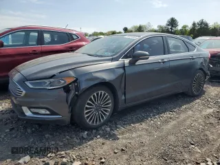 2017 Ford Fusion Titanium с VIN 3FA6P0K97HR132174, выставлен на аукционе Copart как лот 55331905 с пробегом 197 717 миль миль и Чистый • Clean title. История ставок и продаж доступна на DreamBid. Изображение 1.