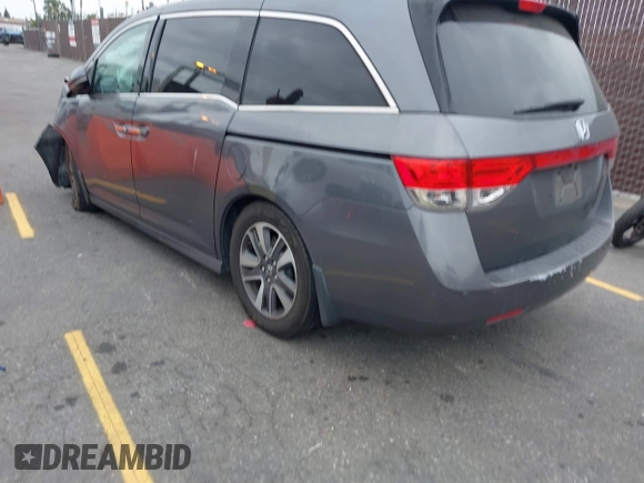 2014 Honda Odyssey Touring with VIN 5FNRL5H97EB114634, listed as a IAAI auction lot 42105220 with Not Provided miles and . Bid and sale history available at carsss.com. Image 3.