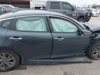 2020 Kia Optima LX z VIN 5XXGT4L39LG448999, wystawiony jako IAAI lot #41620968 z przebiegiem 69 431 mil mil oraz . Historia ofert i sprzedaży dostępna na DreamBid. Obrazek 13.