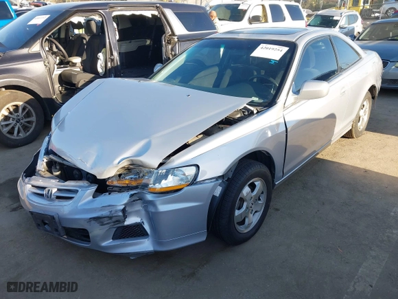 2001 Honda Accord Cpe EX with VIN 1HGCG32571A018284, listed as a IAAI auction lot 42019254 with 157,012 mi miles. Bid and sale history available at carsss.com. Image 22.