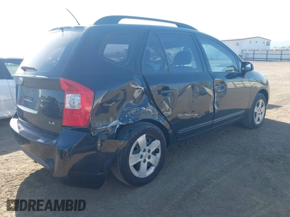 2009 Kia Rondo LX with VIN KNAFG529797268303, listed as a IAAI auction lot 42088100 with 140,458 mi miles. Bid and sale history available at carsss.com. Image 4.