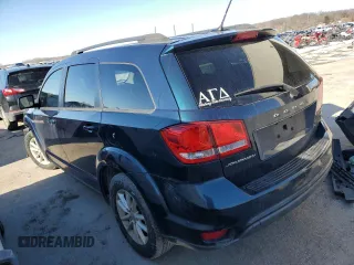 2014 Dodge Journey SXT with VIN 3C4PDCBB6ET104795, listed as a Copart auction lot 88402935 with 144,795 mi miles and Salvage Title. Bid and sale history available at carsss.com. Image 2.