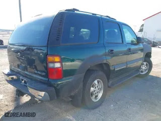 2003 Chevrolet Tahoe LS with VIN 1GNEK13ZX3J344537, listed as a IAAI auction lot 41330298 with 154,878 mi miles. Bid and sale history available at carsss.com. Image 4.