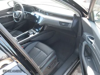 2019 Audi e-tron Premium Plus with VIN WA1LAAGE9KB021724, listed as a IAAI auction lot 41643596 with 34,804 mi miles. Bid and sale history available at carsss.com. Image 5.