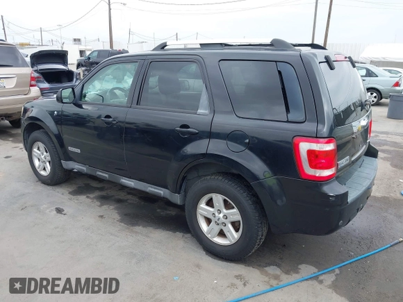 2008 Ford Escape Hybrid with VIN 1FMCU49H38KE50450, listed as a IAAI auction lot 42565336 with Not provided miles and . Bid and sale history available at DreamBid. Image 3.