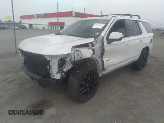 2022 Chevrolet Tahoe LT with VIN 1GNSKNKD5NR143276, listed as a IAAI auction lot 42268541 with 54,463 mi miles and . Bid and sale history available at DreamBid. Image 21.