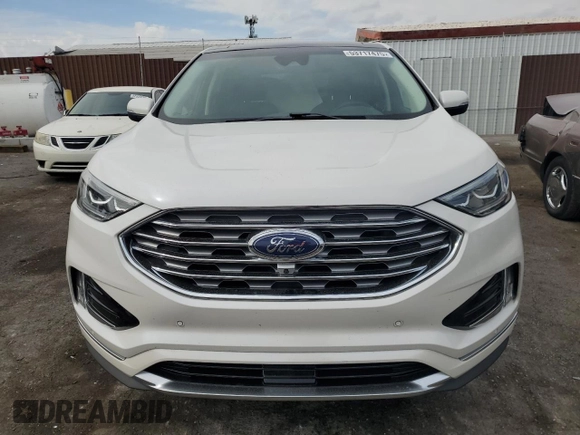 2019 Ford Edge Titanium z VIN 2FMPK3K91KBC11193, wystawiony jako Copart lot #53717475 z przebiegiem 31 599 mil mil oraz Szkoda całkowita • Salvage title. Historia ofert i sprzedaży dostępna na DreamBid. Obrazek 5.