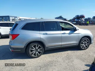 2019 Honda Pilot Elite with VIN 5FNYF6H00KB001016, listed as a IAAI auction lot 42583325 with 133,327 mi miles and . Bid and sale history available at DreamBid. Image 13.