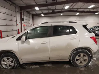2015 Chevrolet Trax LT with VIN 3GNCJRSB7FL203418, listed as a IAAI auction lot 41572289 with 148,402 mi miles and . Bid and sale history available at DreamBid. Image 14.