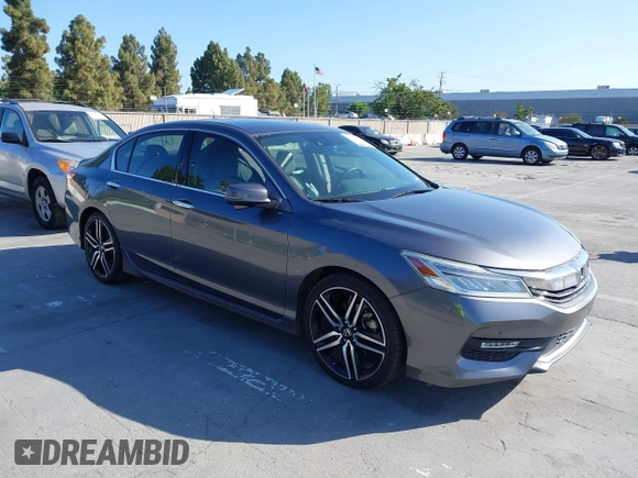 2017 Honda Accord Touring with VIN 1HGCR3F97HA030310, listed as a IAAI auction lot 42539852 with 64,849 mi miles and . Bid and sale history available at DreamBid. Image 1.
