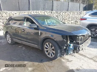 2013 Lincoln MKT EcoBoost with VIN 2LMHJ5AT9DBL52598, listed as a IAAI auction lot 41468952 with 267,240 mi miles. Bid and sale history available at carsss.com. Image 1.