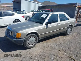 1986 Mercedes-Benz 190 E z VIN WDBDA24D0GF194753, wystawiony jako IAAI lot #42321094 z przebiegiem 135 395 mil mil oraz . Historia ofert i sprzedaży dostępna na DreamBid. Obrazek 2.