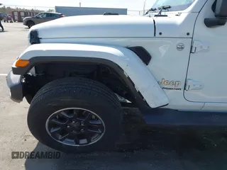 2022 Jeep Gladiator High Altitude with VIN 1C6HJTFG1NL167518, listed as a IAAI auction lot 41838411 with 20,885 mi miles and . Bid and sale history available at DreamBid. Image 6.