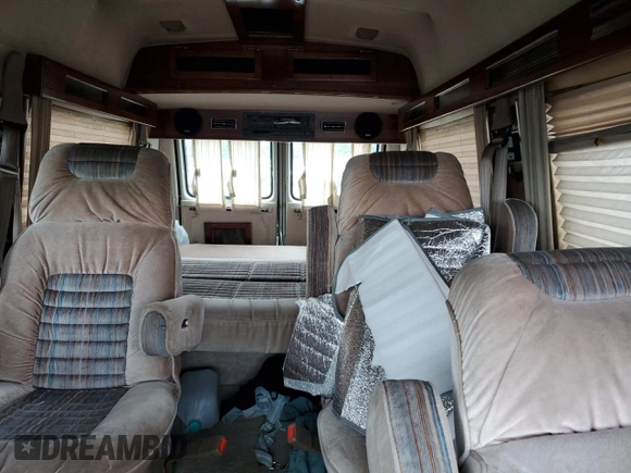 1992 Chevrolet Chevy Van с VIN 1GBEG25K2N7130047, выставлен на аукционе Copart как лот 68682724 с пробегом 143 585 миль миль и Списание • Salvage title. История ставок и продаж доступна на DreamBid. Изображение 10.