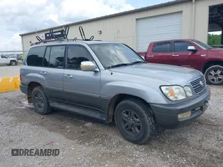 2001 Lexus LX 470 z VIN JTJHT00W713504833, wystawiony jako IAAI lot #42485592 z przebiegiem 290 772 mil mil oraz . Historia ofert i sprzedaży dostępna na DreamBid. Obrazek 1.