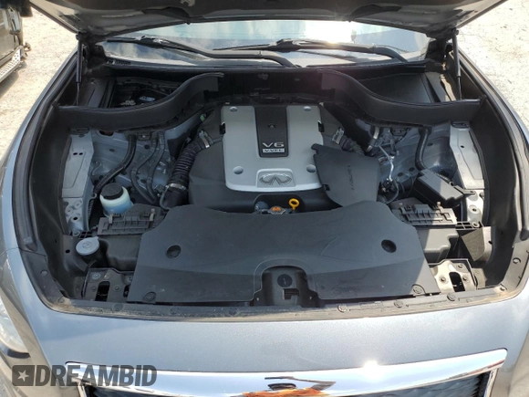 2017 Infiniti QX70 z VIN JN8CS1MU8HM142437, wystawiony jako Copart lot #66139144 z przebiegiem 104 241 mil mil oraz Szkoda całkowita • Salvage title. Historia ofert i sprzedaży dostępna na DreamBid. Obrazek 12.