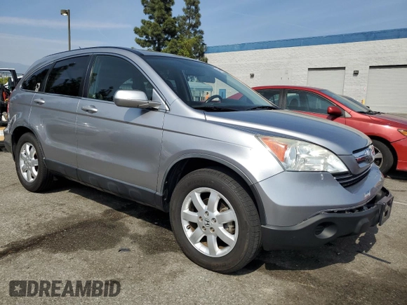 2007 Honda CR-V EX-L with VIN JHLRE48797C082484, listed as a Copart auction lot 54368615 with 134,703 mi miles and Salvage Title. Bid and sale history available at carsss.com. Image 4.