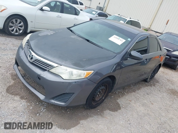 2014 Toyota Camry L with VIN 4T1BF1FK1EU771679, listed as a IAAI auction lot 42090764 with 216,362 mi miles and . Bid and sale history available at DreamBid. Image 17.
