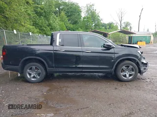 2021 Honda Ridgeline RTL-E with VIN 5FPYK3F75MB015370, listed as a IAAI auction lot 42253586 with 84,188 mi miles and . Bid and sale history available at DreamBid. Image 13.