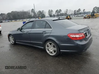 2010 Mercedes-Benz E 550 Luxury with VIN WDDHF7CB9AA030137, listed as a Copart auction lot 86839044 with 223,094 mi miles and Salvage Title. Bid and sale history available at DreamBid. Image 2.