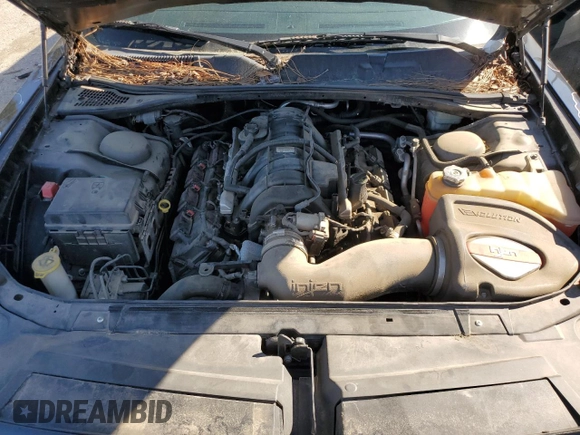 2014 Dodge Challenger R/T z VIN 2C3CDYBT2EH165224, wystawiony jako Copart lot #48183855 z przebiegiem 139 037 mil mil oraz Szkoda całkowita • Salvage title. Historia ofert i sprzedaży dostępna na DreamBid. Obrazek 11.