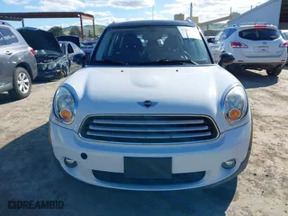 2013 MINI Cooper Countryman with VIN WMWZB3C51DWM31277, listed as a IAAI auction lot 41506486 with 79,006 mi miles. Bid and sale history available at carsss.com. Image 13.