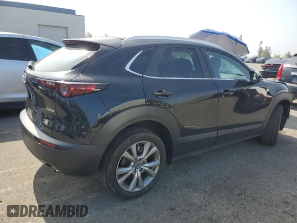 2023 Mazda CX-30 S Select with VIN 3MVDMBBM7PM582394, listed as a Copart auction lot 59786415 with Not provided miles and Salvage title. Bid and sale history available at DreamBid. Image 3.