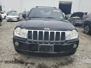 2007 Jeep Grand Cherokee Overland with VIN 1J8HR68227C651830, listed as a Copart auction lot 62403725 with 147,827 mi miles and Salvage title. Bid and sale history available at DreamBid. Image 5.