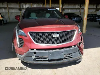 2019 Cadillac XT4 FWD Sport z VIN 1GYFZER44KF160024, wystawiony jako Copart lot #56767925 z przebiegiem 82 881 mil mil oraz Szkoda całkowita • Salvage title. Historia ofert i sprzedaży dostępna na DreamBid. Obrazek 5.