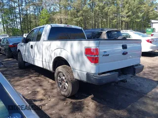 2014 Ford F-150 XL with VIN 1FTFX1CTXEFC01524, listed as a IAAI auction lot 41955270 with 251,992 mi miles. Bid and sale history available at carsss.com. Image 3.