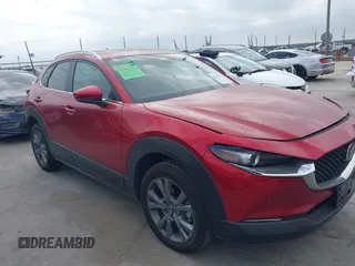 2025 Mazda CX-30 S Carbon Edition z VIN 3MVDMBCM8SM793580, wystawiony jako IAAI lot #42159191 z przebiegiem 3 857 mil mil oraz . Historia ofert i sprzedaży dostępna na DreamBid. Obrazek 1.