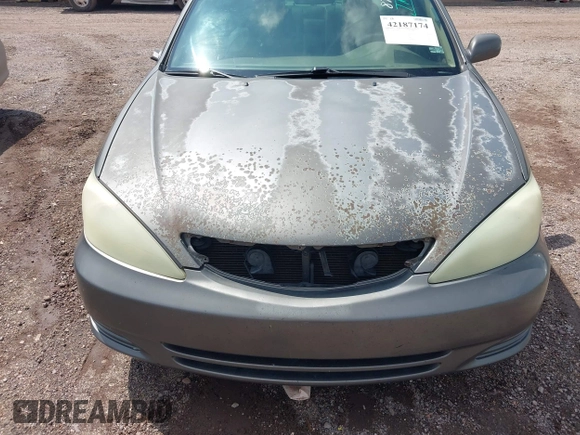 2004 Toyota Camry LE with VIN 4T1BE30K24U921028, listed as a IAAI auction lot 42187174 with 295,174 mi miles and . Bid and sale history available at DreamBid. Image 13.