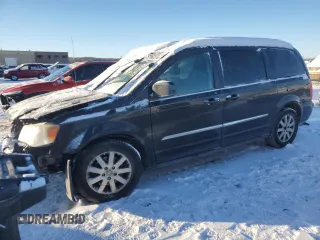 2014 Chrysler Town & Country Touring with VIN 2C4RC1BG7ER300744, listed as a Copart auction lot 37990234 with 111,952 mi miles and Salvage Title. Bid and sale history available at carsss.com. Image 1.