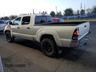 2012 Toyota Tacoma with VIN 3TMMU4FN0CM043190, listed as a Copart auction lot 49410125 with 126,449 mi miles and Salvage title. Bid and sale history available at DreamBid. Image 2.