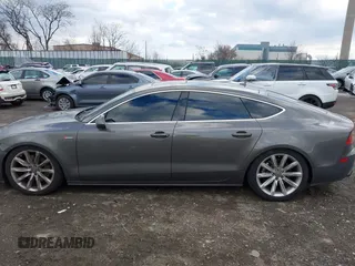 2013 Audi A7 3.0 Premium Plus with VIN WAUYGAFC5DN077054, listed as a IAAI auction lot 41298537 with 150,679 mi miles. Bid and sale history available at carsss.com. Image 14.