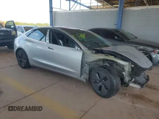 2018 Tesla Model 3 Long Range Battery with VIN 5YJ3E1EA2JF016631, listed as a Copart auction lot 55527095 with 129,547 mi miles and Salvage Title. Bid and sale history available at DreamBid. Image 4.