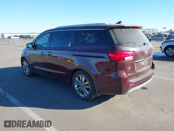 2015 Kia Sedona SX-L with VIN KNDME5C15F6046322, listed as a IAAI auction lot 41301459 with 76,026 mi miles and . Bid and sale history available at DreamBid. Image 3.