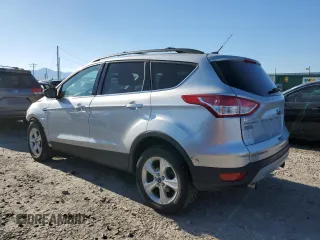 2013 Ford Escape SE z VIN 1FMCU9G96DUD12621, wystawiony jako Copart lot #56176175 z przebiegiem 85 597 mil mil oraz Szkoda całkowita • Salvage title. Historia ofert i sprzedaży dostępna na DreamBid. Obrazek 2.