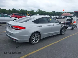 2017 Ford Fusion Hybrid SE with VIN 3FA6P0LU2HR317784, listed as a IAAI auction lot 42618554 with 114,814 mi miles and . Bid and sale history available at DreamBid. Image 4.