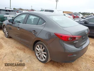 2017 Mazda 3 Touring z VIN JM1BN1V77H1101001, wystawiony jako IAAI lot #41393592 z przebiegiem 77 566 mil mil oraz . Historia ofert i sprzedaży dostępna na DreamBid. Obrazek 3.