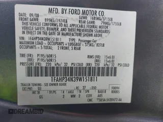 2009 Ford Focus S with VIN 1FAHP34N39W151811, listed as a IAAI auction lot 41911138 with 125,325 mi miles. Bid and sale history available at carsss.com. Image 9.