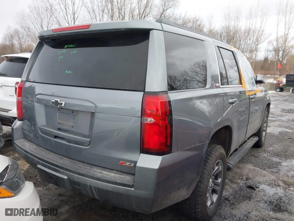 2018 Chevrolet Tahoe LT with VIN 1GNSKBKC4JR183090, listed as a IAAI auction lot 41427881 with 114,031 mi miles. Bid and sale history available at carsss.com. Image 4.