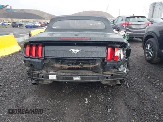 2020 Ford Mustang EcoBoost z VIN 1FATP8UH7L5131625, wystawiony jako IAAI lot #42295906 z przebiegiem 74 572 mil mil oraz . Historia ofert i sprzedaży dostępna na DreamBid. Obrazek 16.