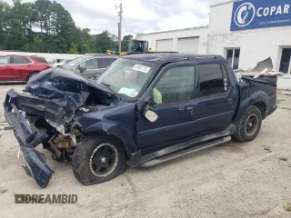 2003 Ford Explorer Sport Trac XLS with VIN 1FMZU77E63UB37720, listed as a Copart auction lot 61001775 with 379,581 mi miles and Salvage title. Bid and sale history available at DreamBid. Image 1.